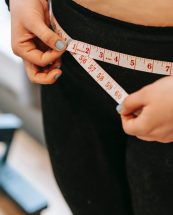 Measuring a Waist With A Tape Measure